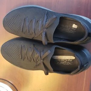 Skechers air-cooled memory foam sneakers.